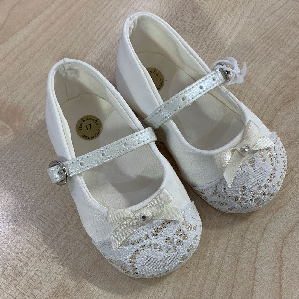 
  Shoes from the Ambarabà children's clothing line, in very soft materials and
  with craftsmans...