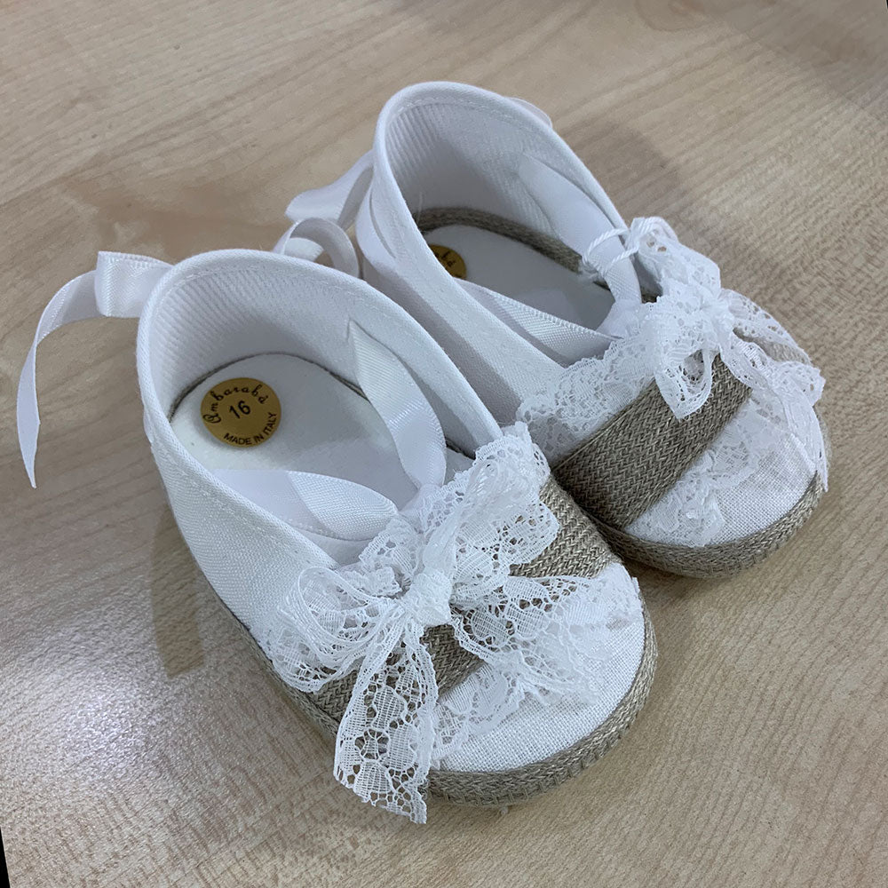 
  Shoes from the Ambarabà children's clothing line, in very soft materials and
  with craftsmans...