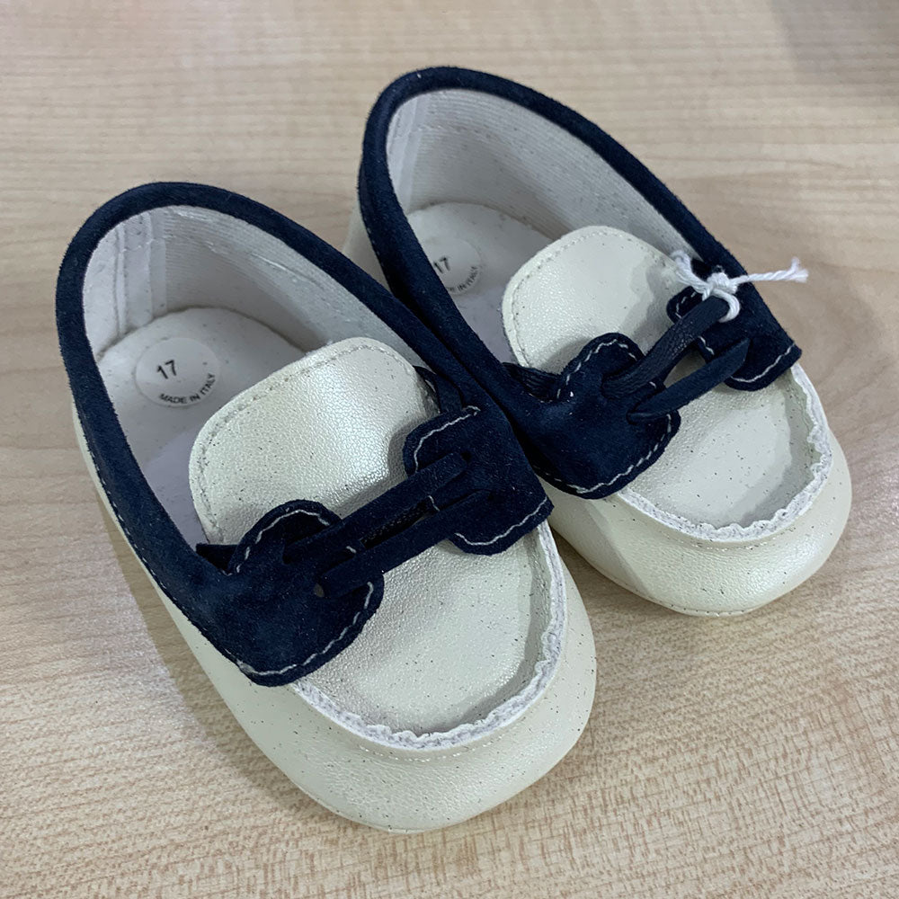 
  Shoes from the Ambarabà children's clothing line, in very soft materials and
  with craftsmans...