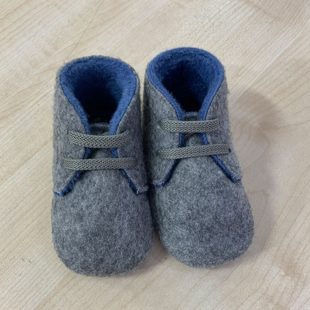 
  Shoes from the Ambarabà children's clothing line, in very soft materials and
  with craftsmans...