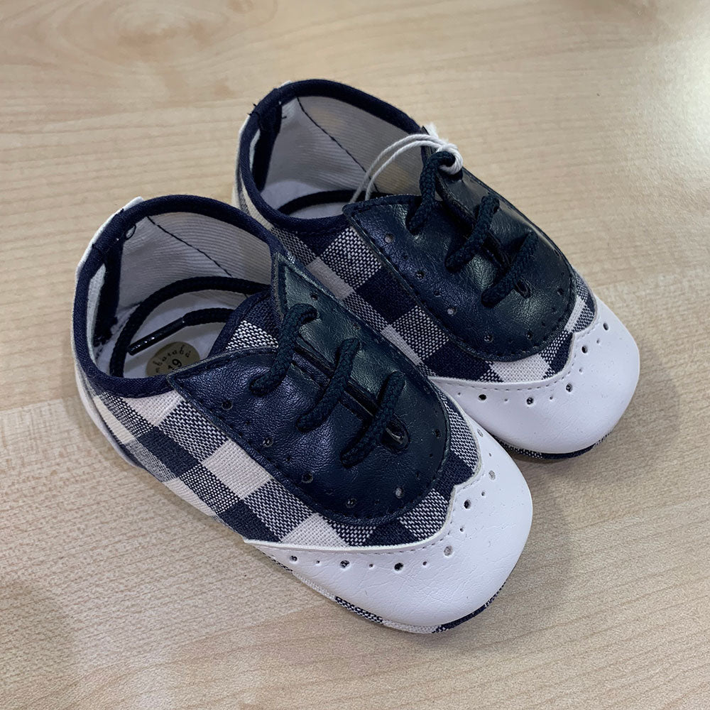 
  Shoes from the Ambarabà children's clothing line, in very soft materials and
  with craftsmans...