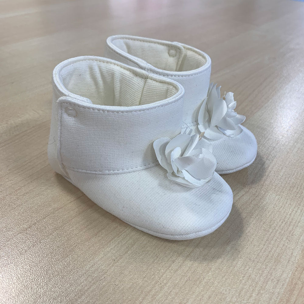 
  Shoes from the Ambarabà children's clothing line, in very soft materials and
  with craftsmans...