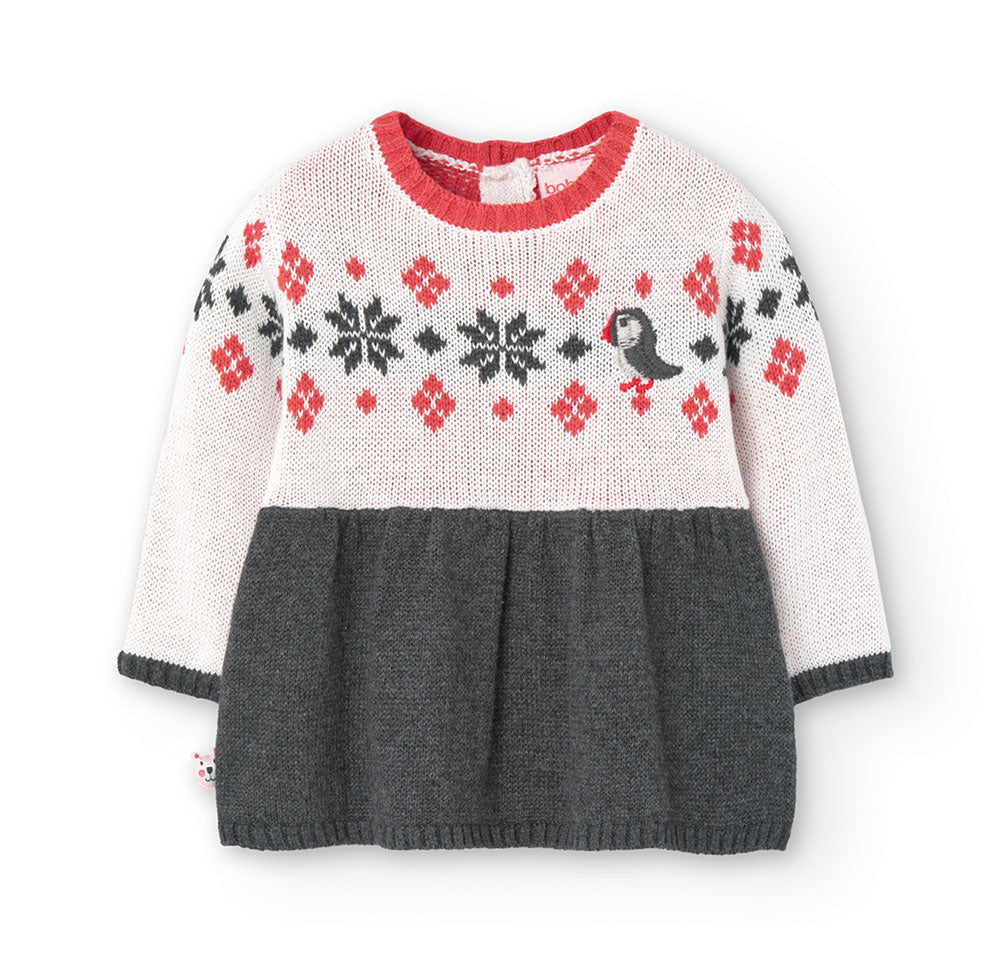 Knit dress from the Boboli Children's Clothing Line, with a wide skirt and patterned top with emb...