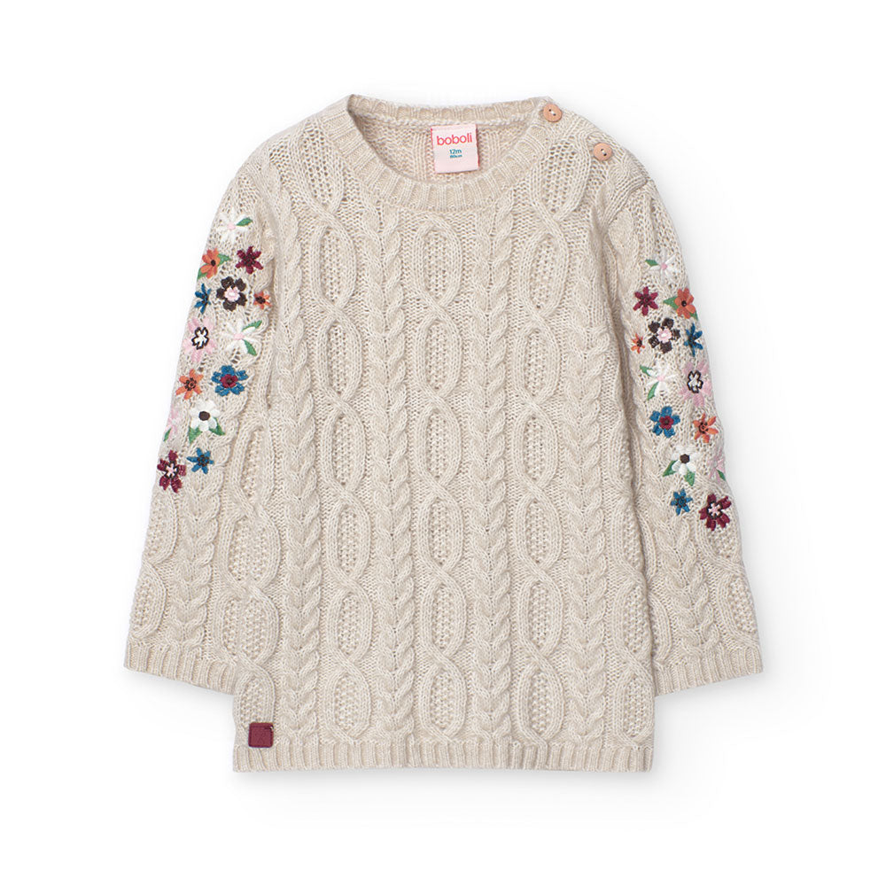 
Knit dress from Boboli's Girl's Clothing Line, with braid work and wooden buttons on one side.

...