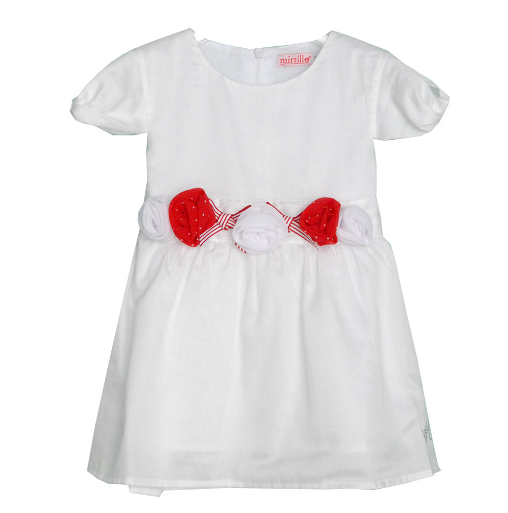 Dress from the Mirtillo girl's clothing line in muslin. Solid color; sleeves with knot. Belt with...