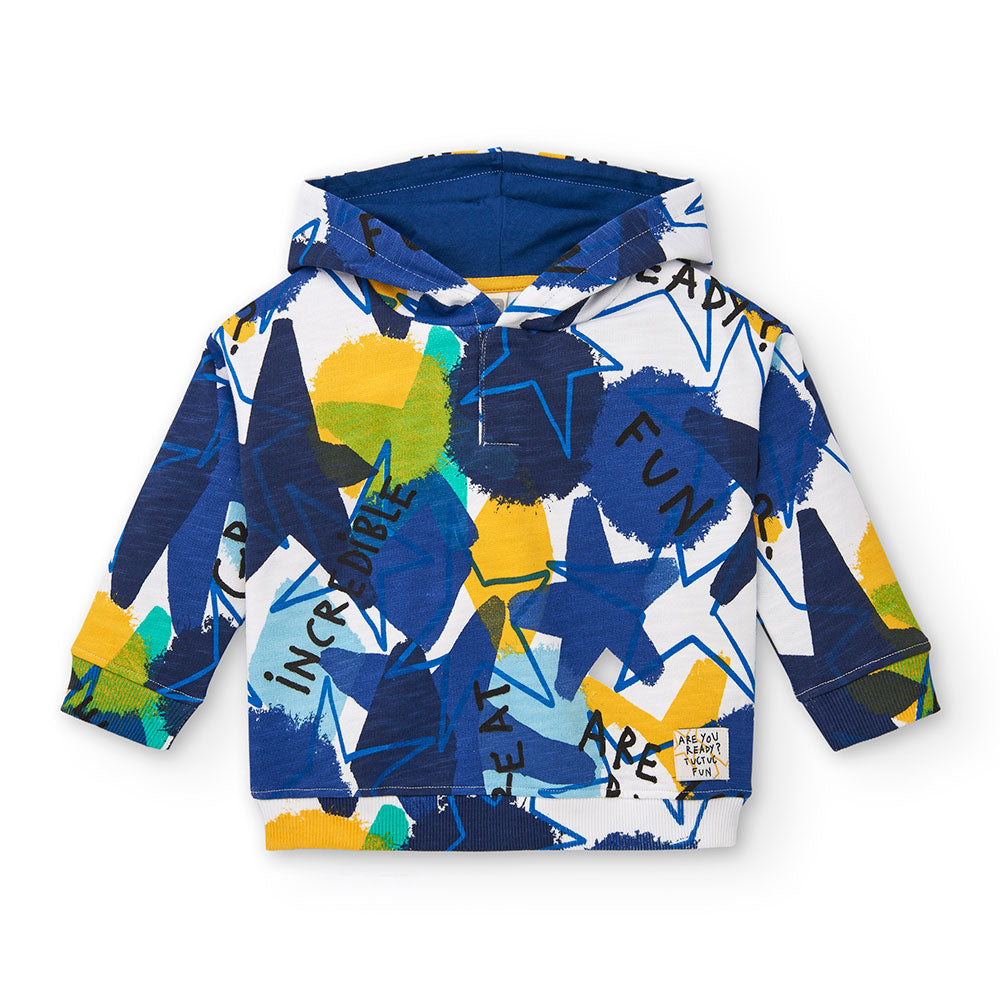 Hooded sweatshirt from the Tuc Tuc children's clothing line, with geometric patterns in bright co...